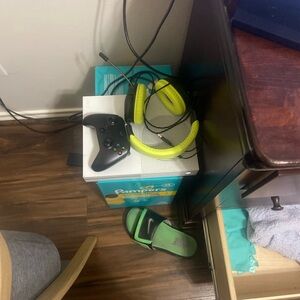 Microsoft Console with Black Controller and Green Headset